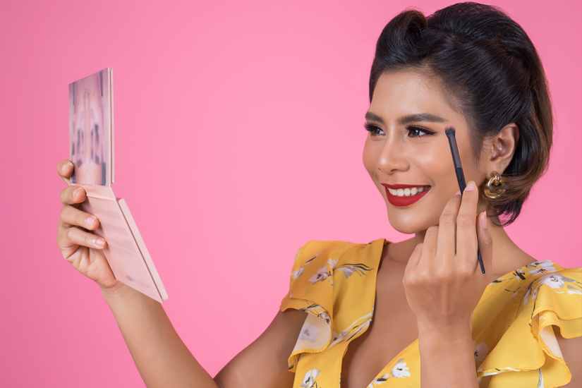 woman-with-makeup-brush